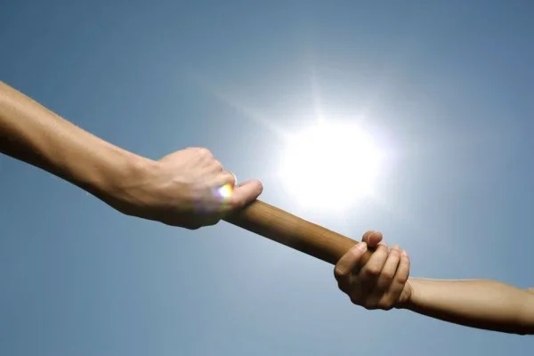 relay race baton exchange